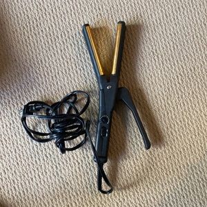 Electric Flatiron with 12 temperature settings.